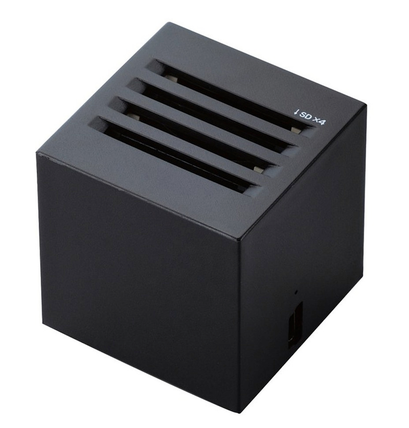 Illustration for article titled Minimalist SD Reader Also Looks Like a Toaster